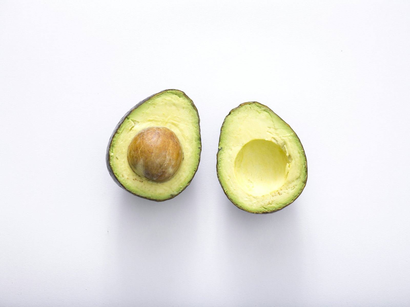 Hass avocado cut in half